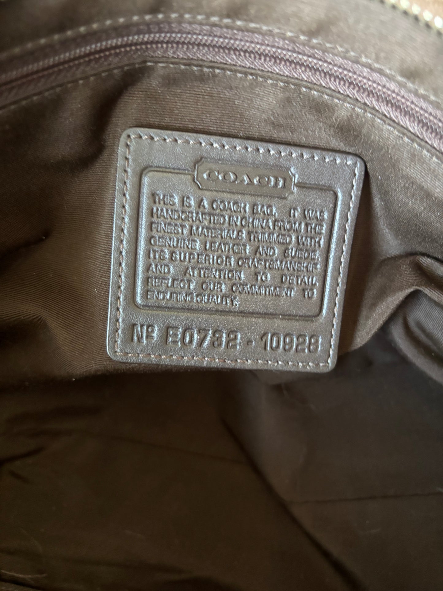 Brown mongram coach tote bag