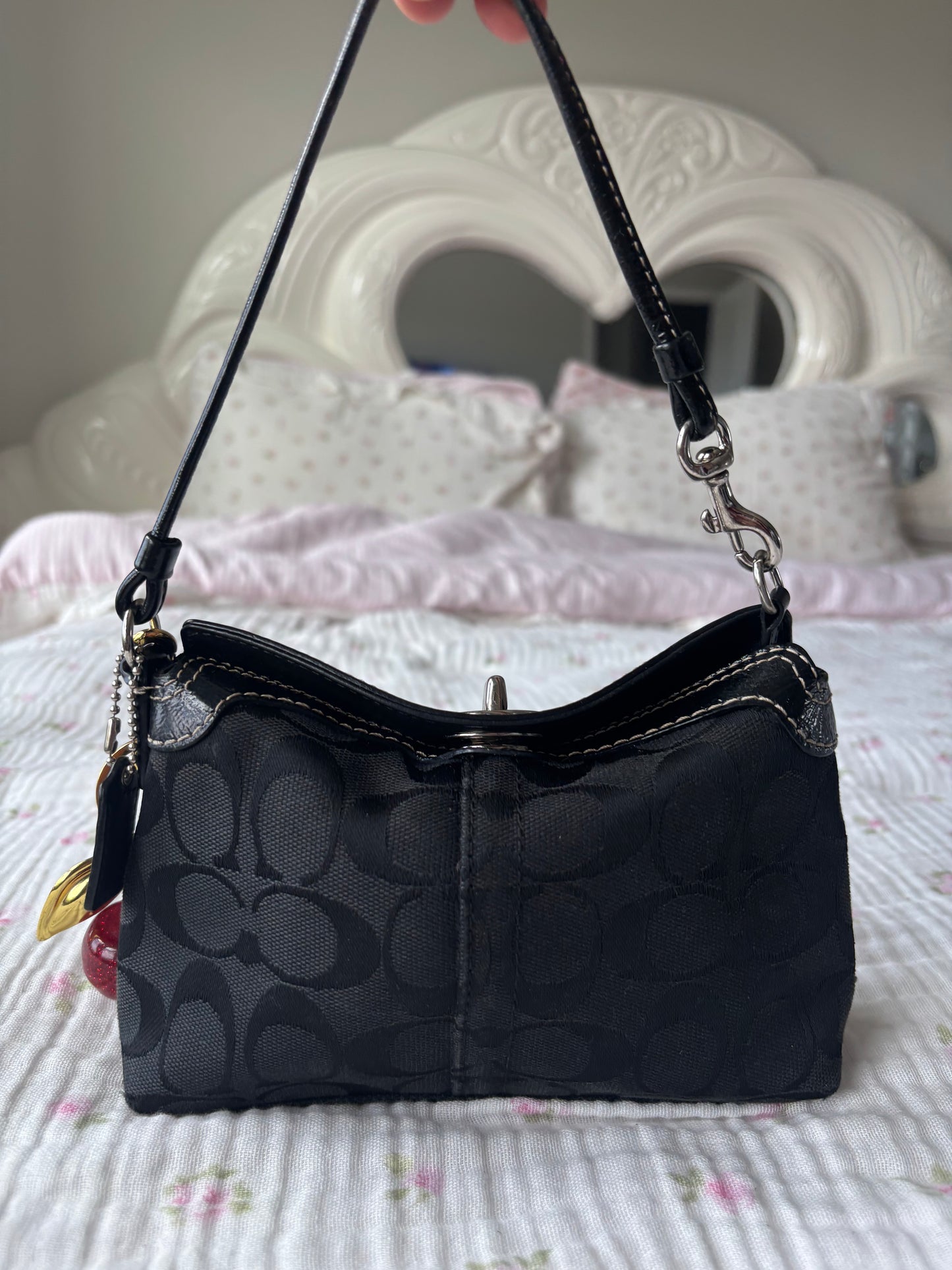 Black mini coach handbag