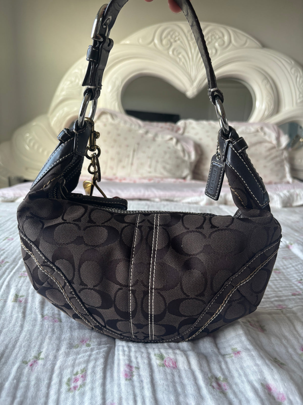 Brown mongram coach hobo bag