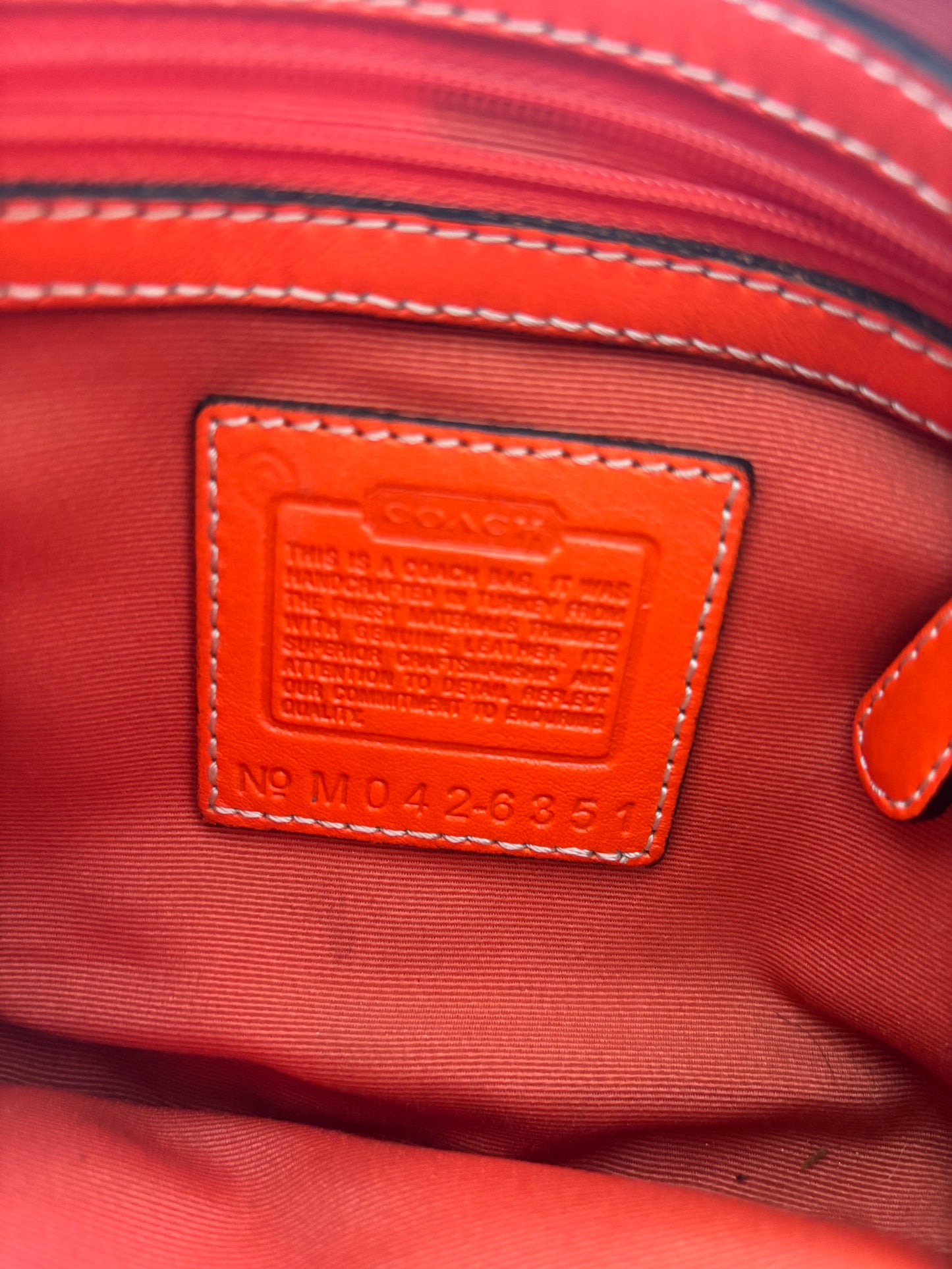 Orange coach mini hobo bag