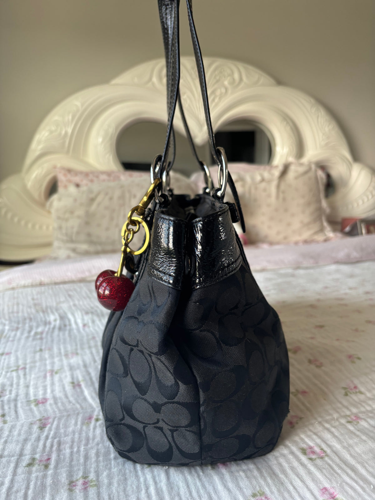 Black mongram coach bag
