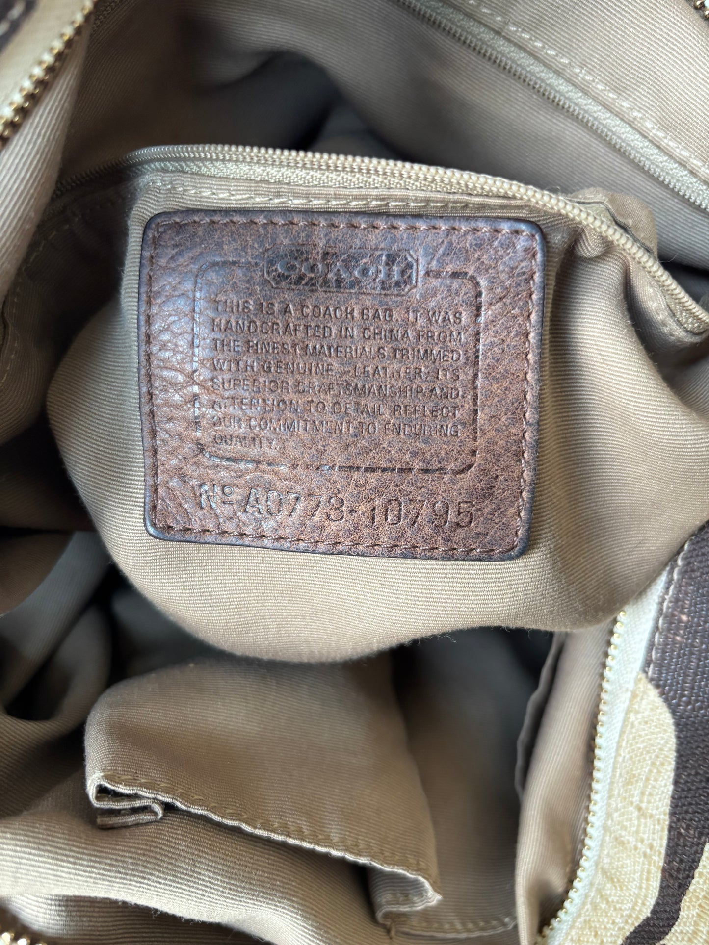 Rare cream & brown coach large Carly