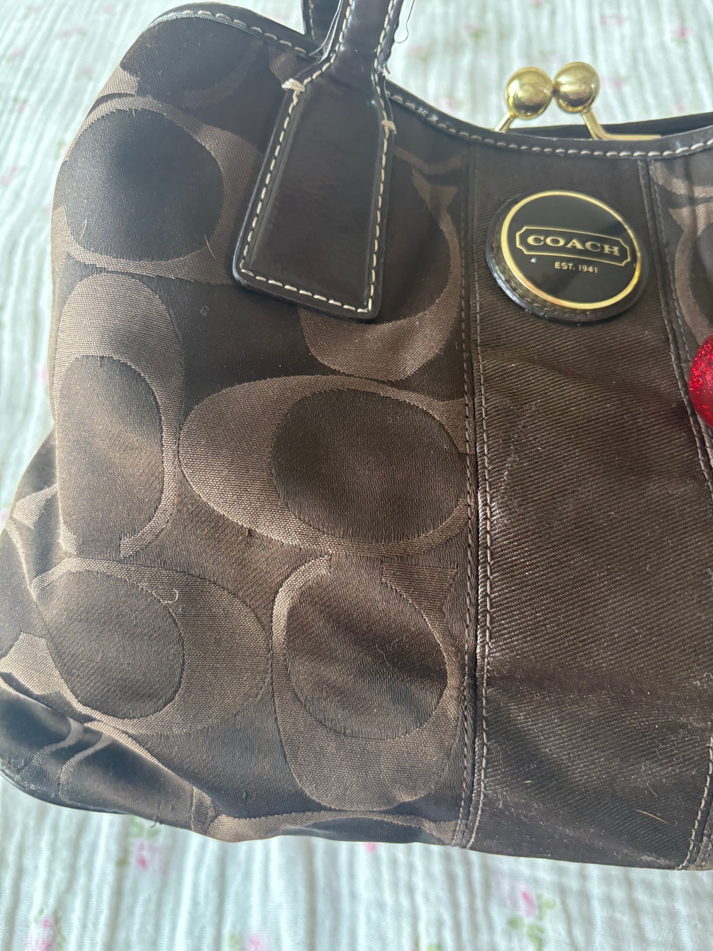 Brown coach kisslock tote