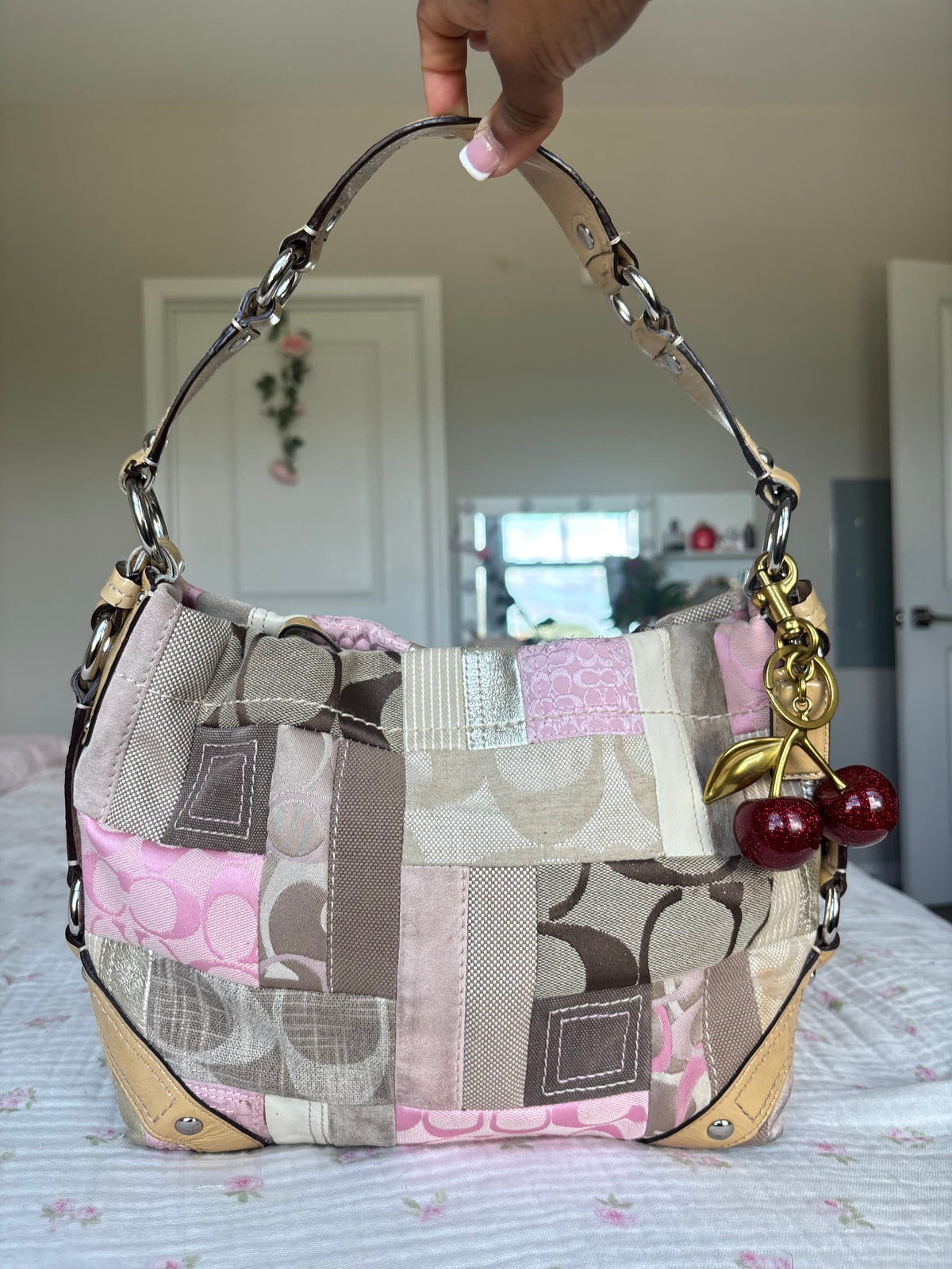 Rare pink patchwork coach Carly