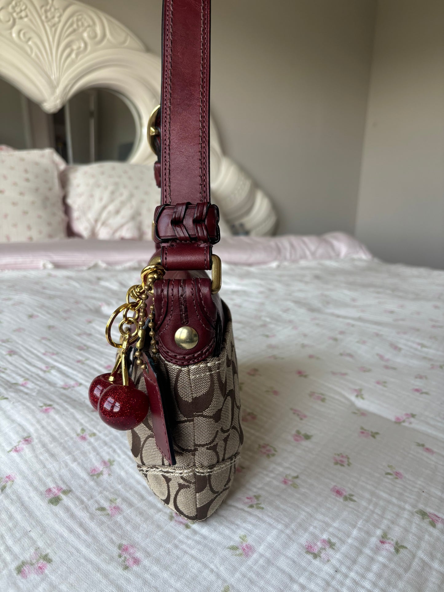 Burgandy peakook coach soho shoulder bag