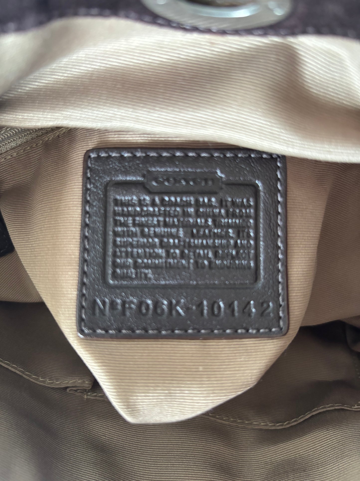 Brown optic coach shoulder bag