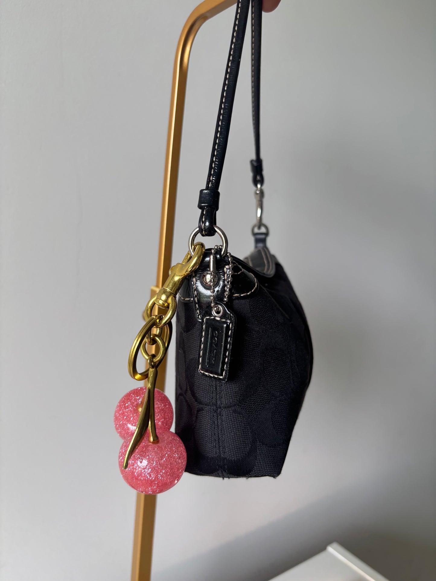 Black small coach handbag