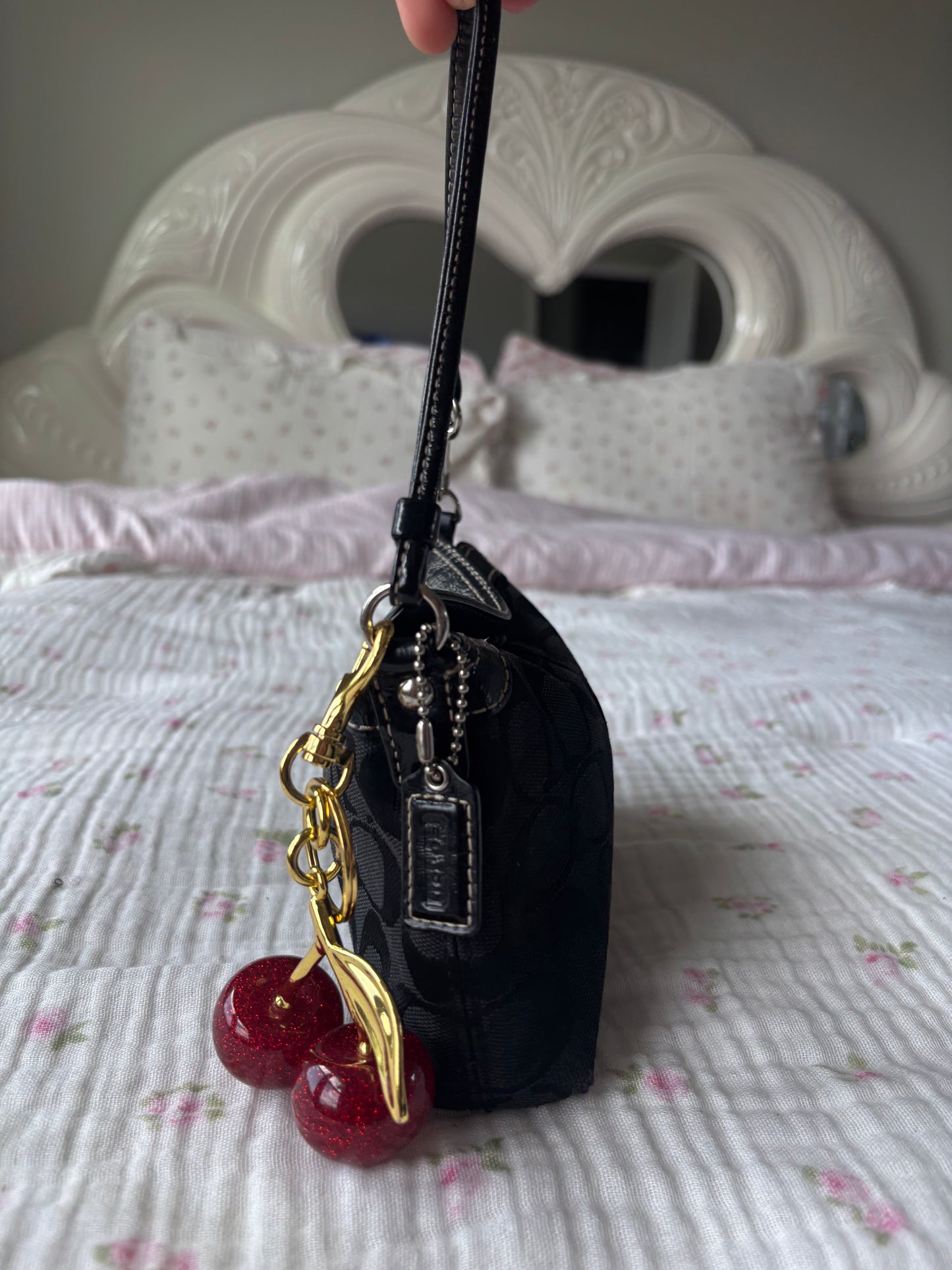 Black mini coach handbag