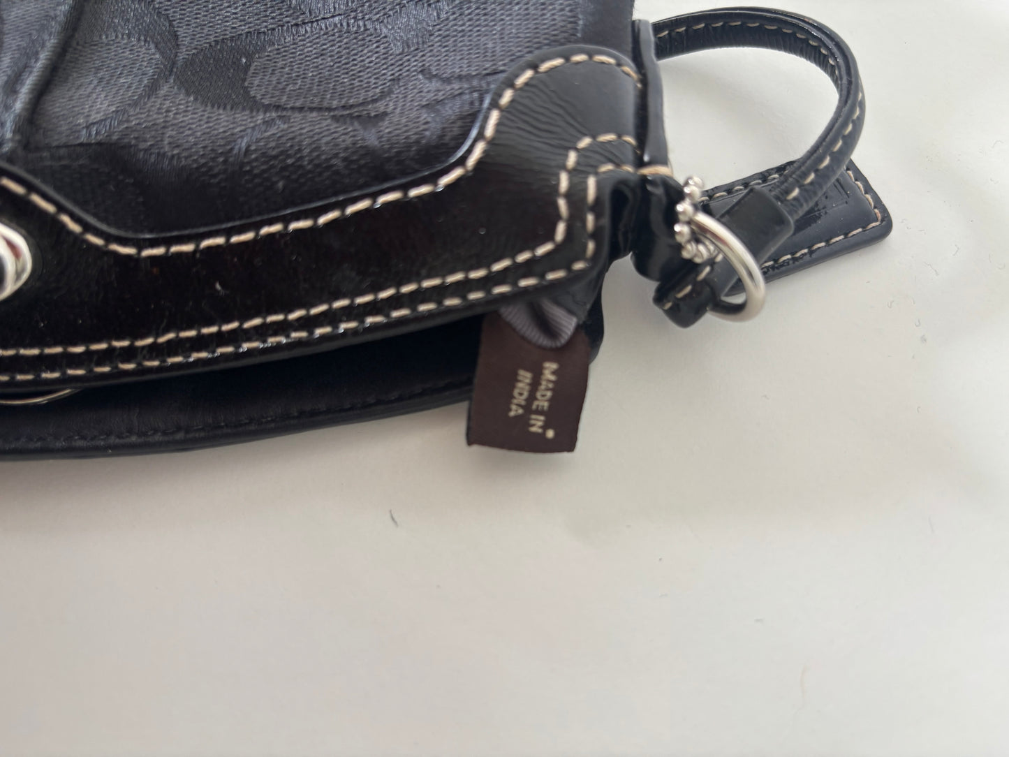 Black small coach handbag