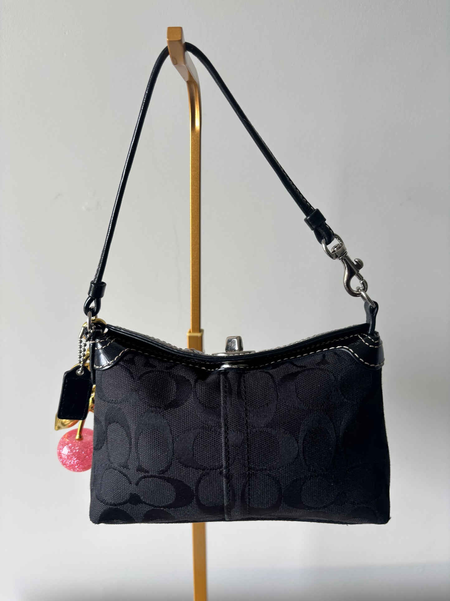 Black small coach handbag