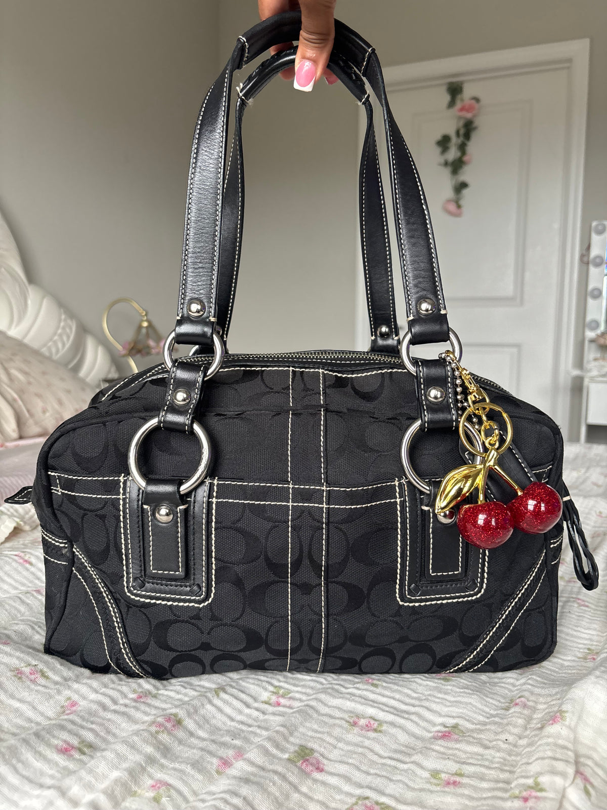 Black mongram coach satchel