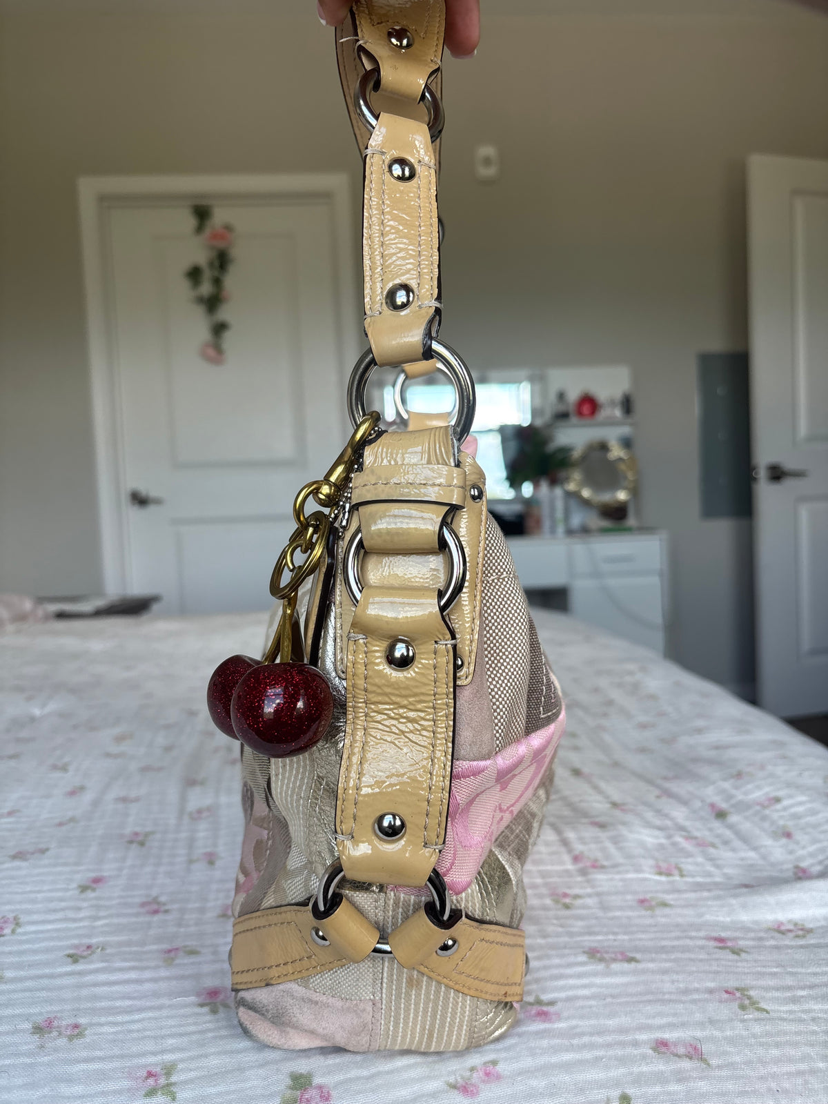 Rare pink patchwork coach Carly