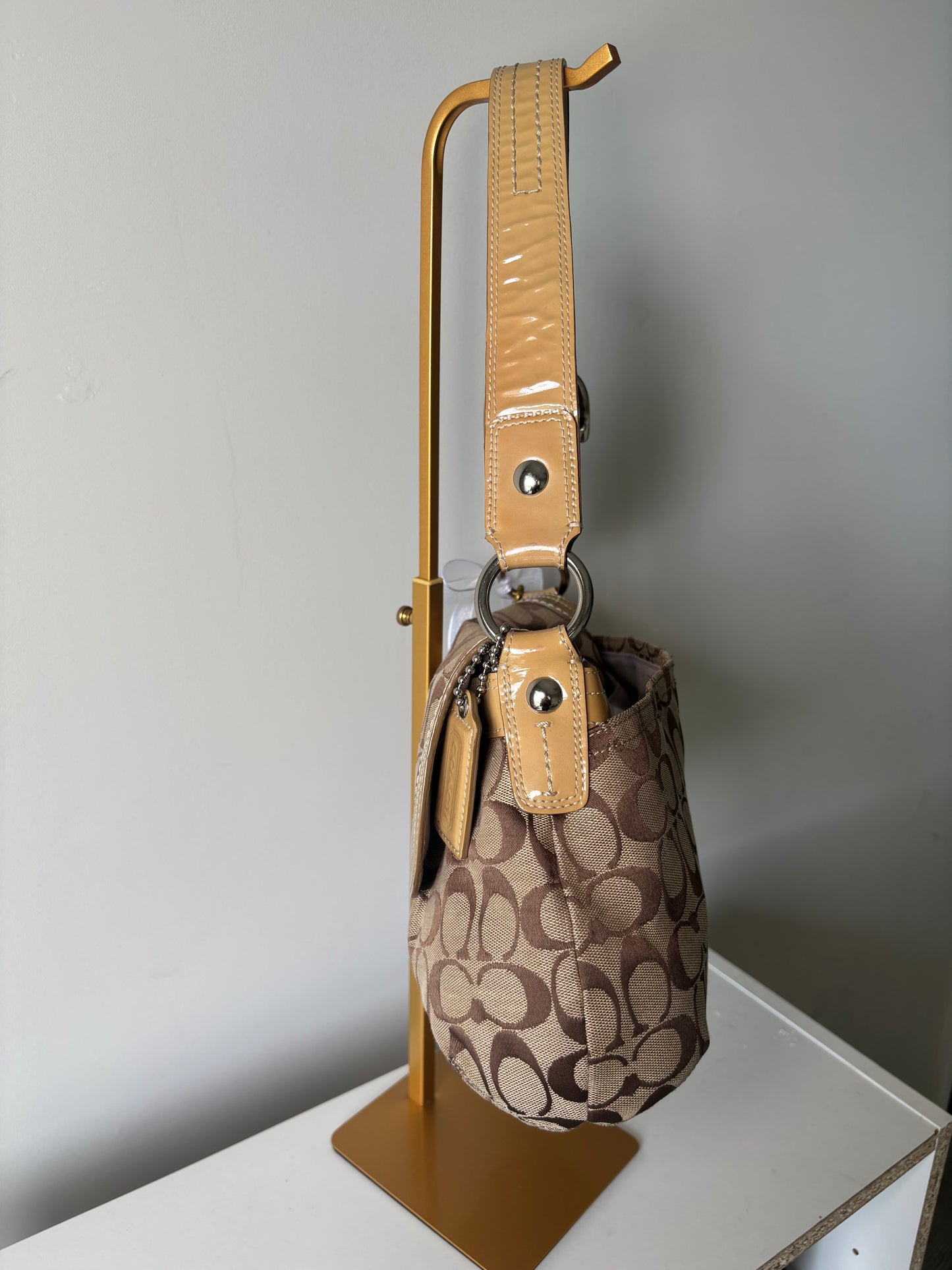 Brown mongram coach flap shoulder bag