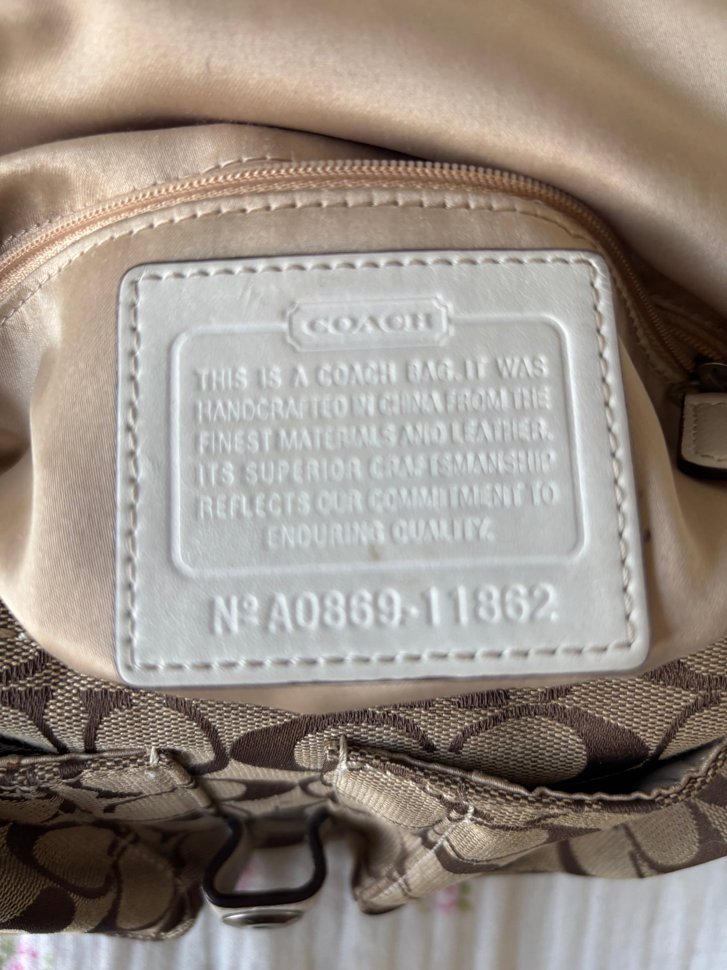 White mongram coach soho shoulder bag