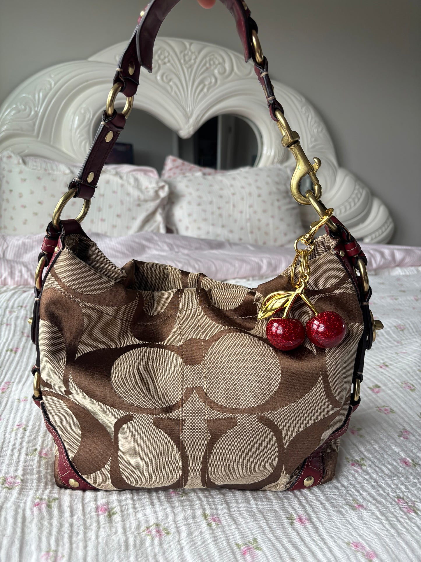 Brown mongram coach Carly