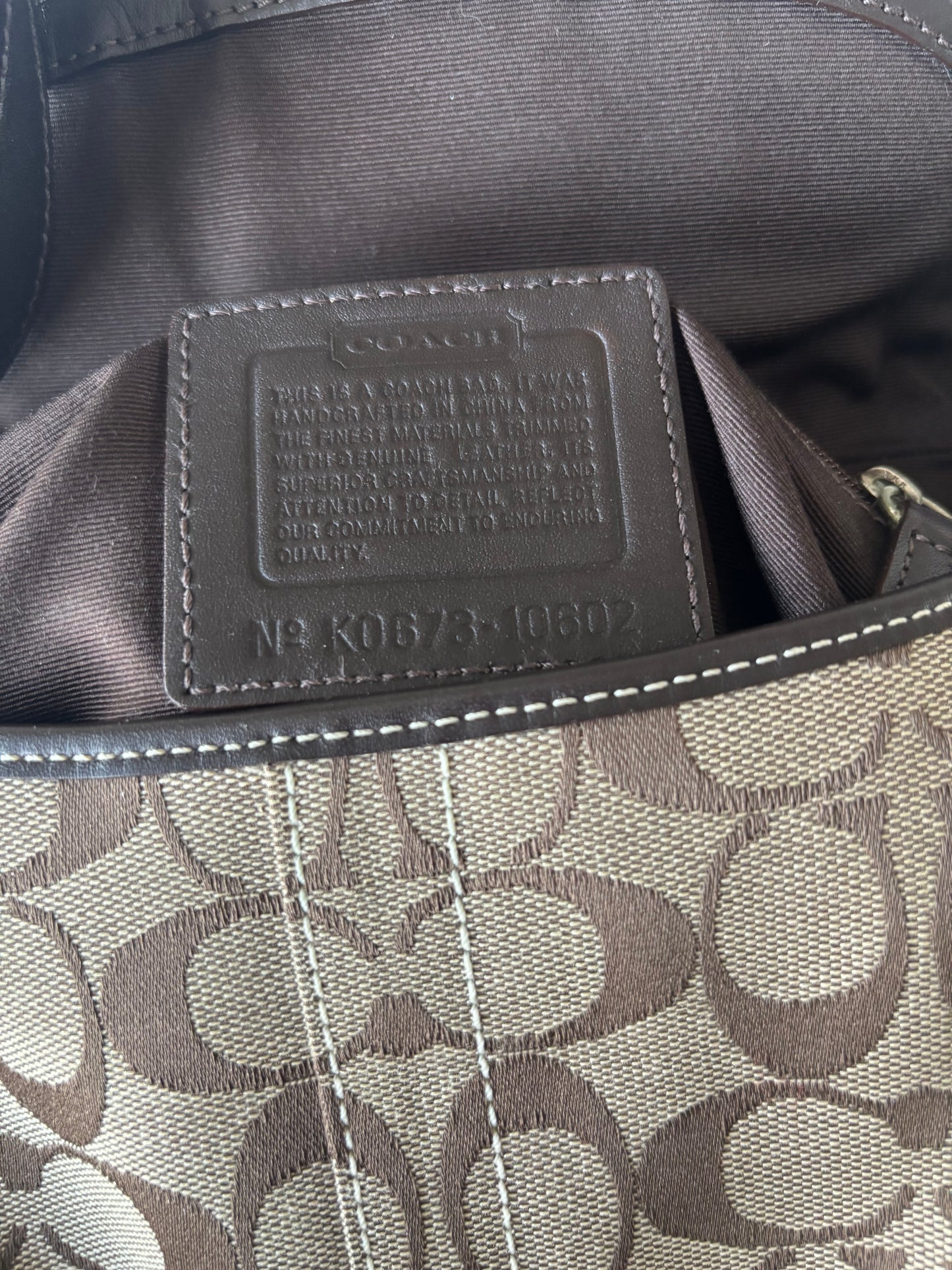 Rare brown mongram mini coach soho bag