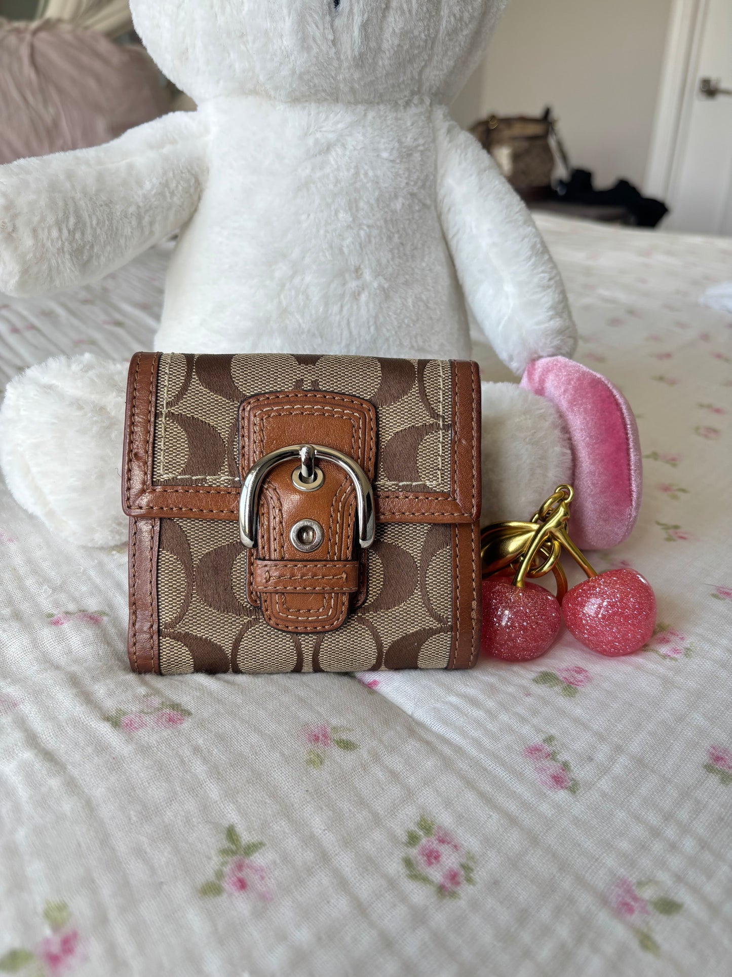 Brown mongram soho coach wallet