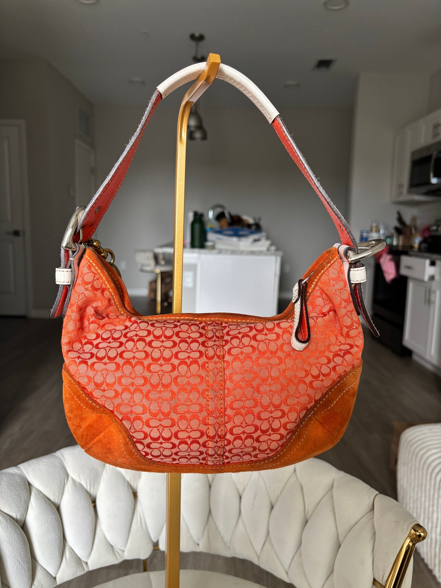 Orange coach mini hobo bag
