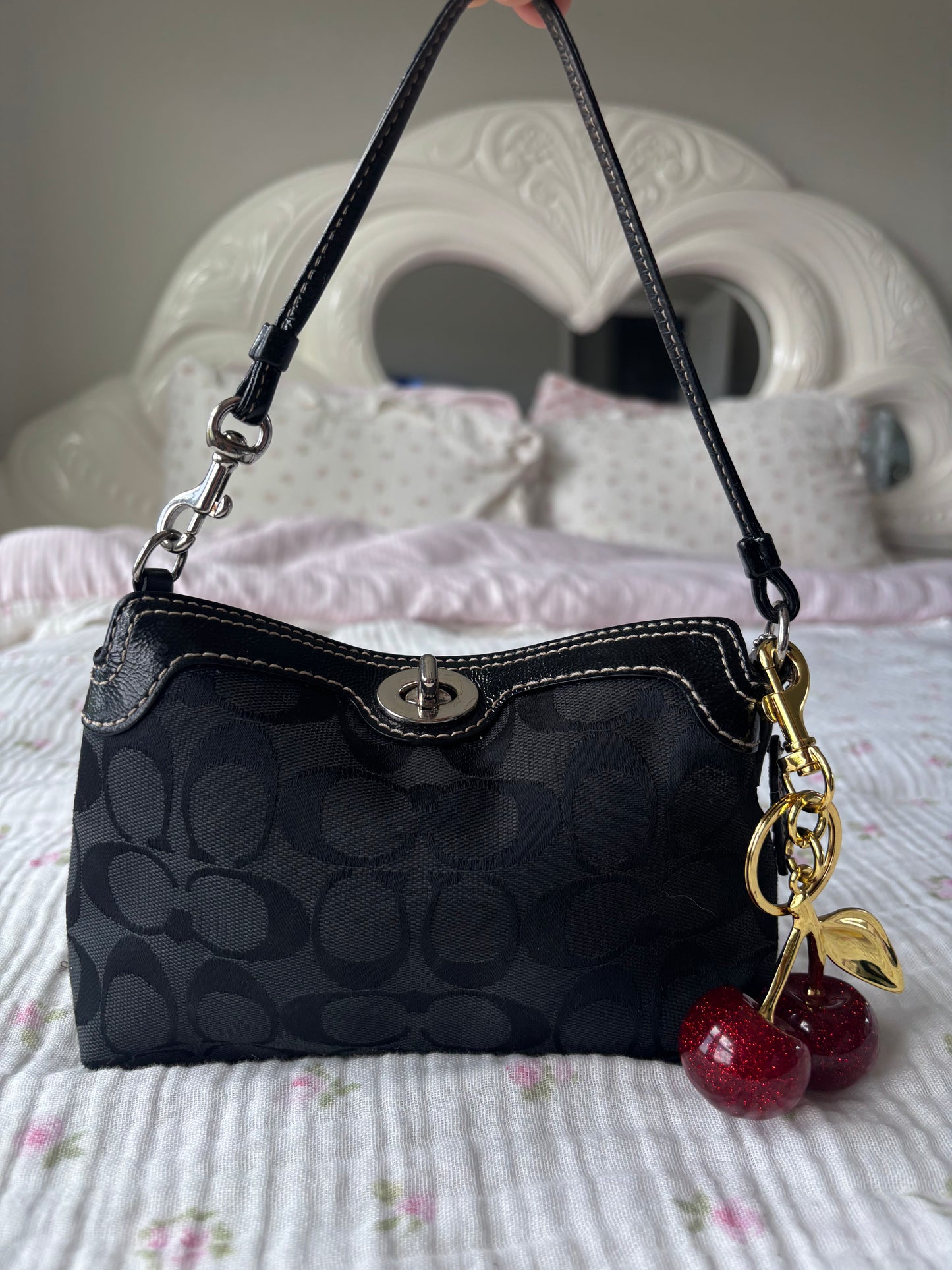 Black mini coach handbag