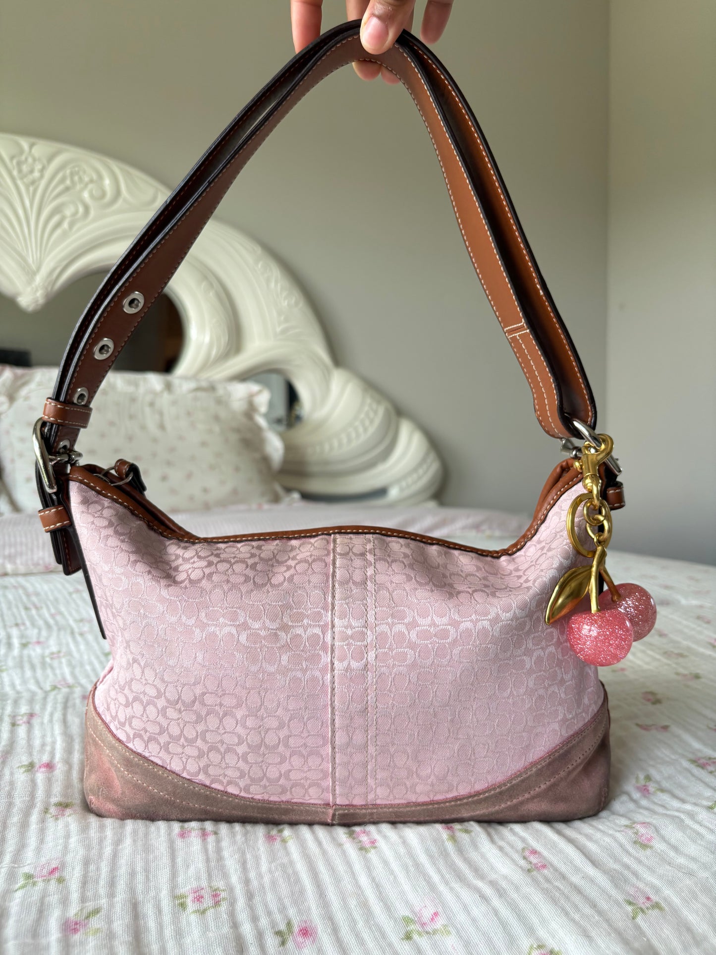 Pink mongram coach shoulder bag