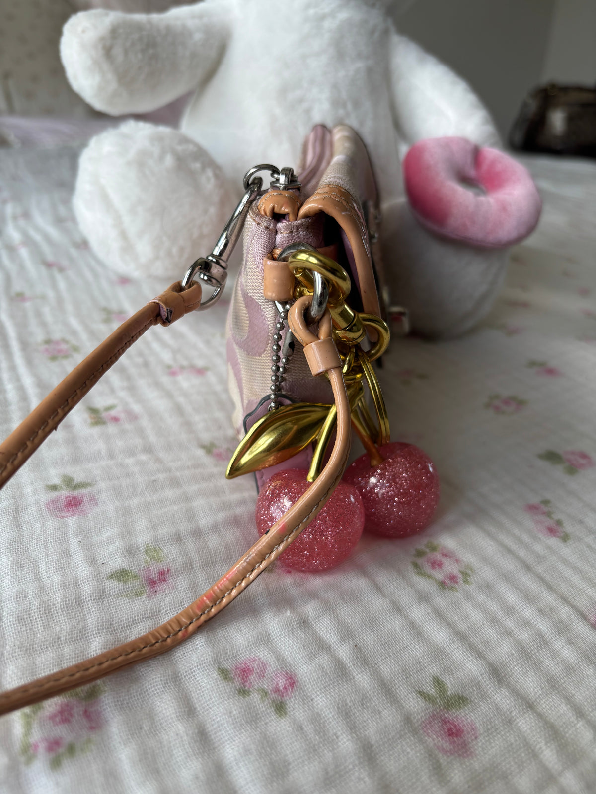 Pink mongram coach wristlet