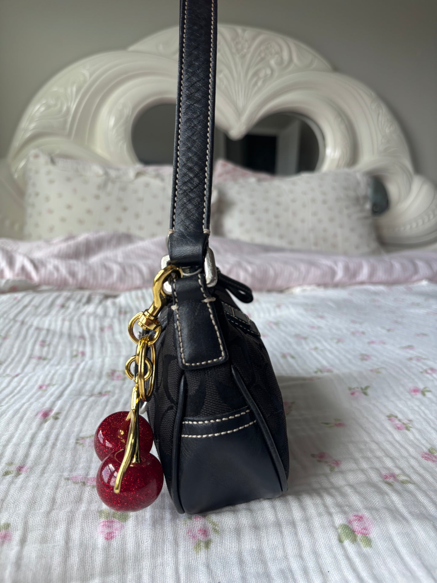 Black mongram coach Hampton soho