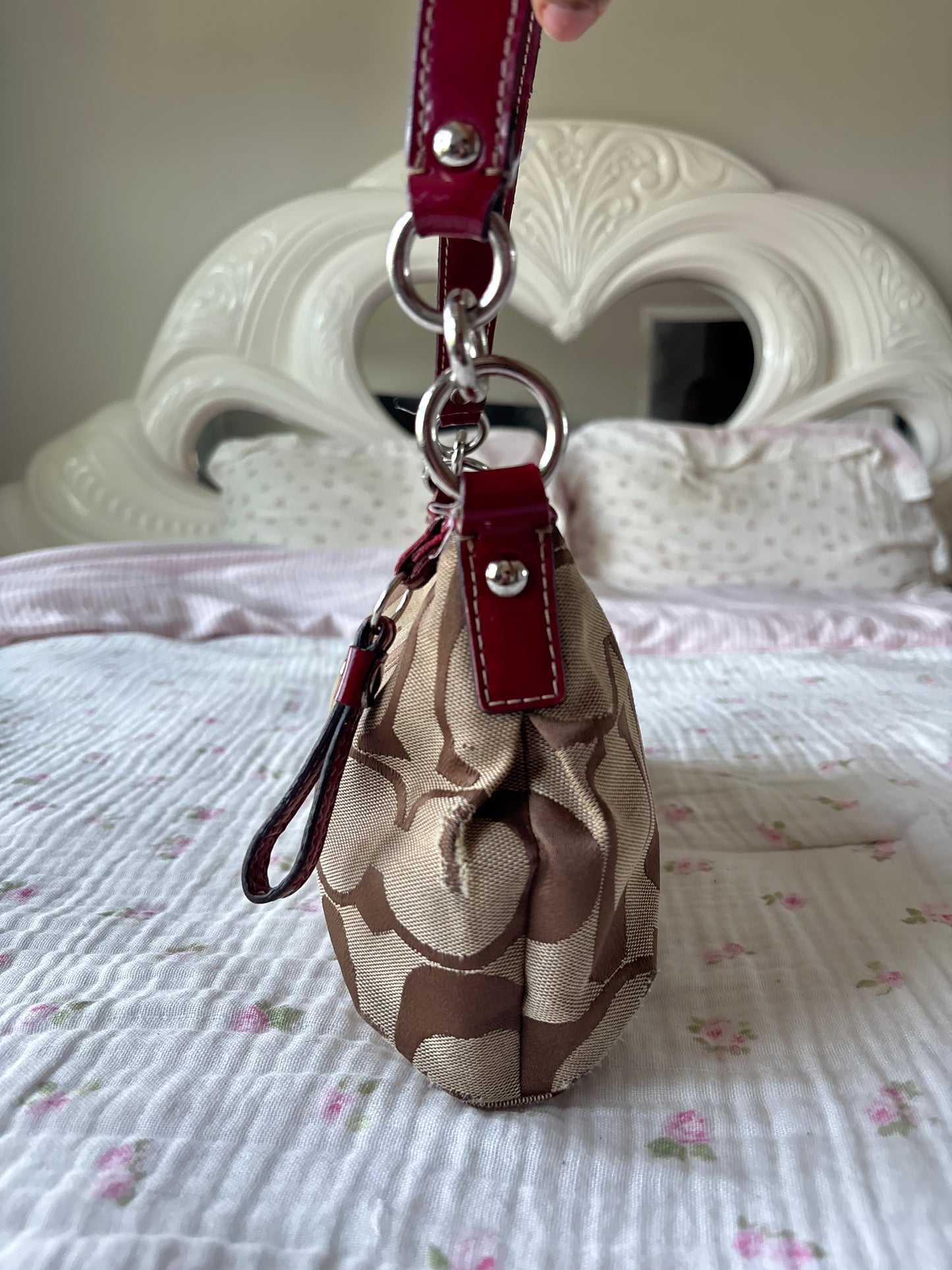 Red mongram coach shoulder bag