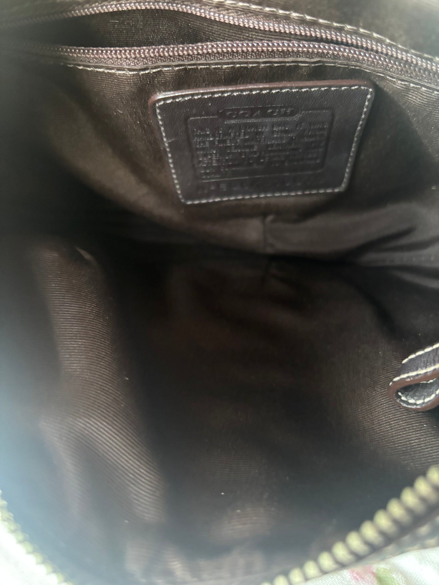 Brown mongram coach hobo bag