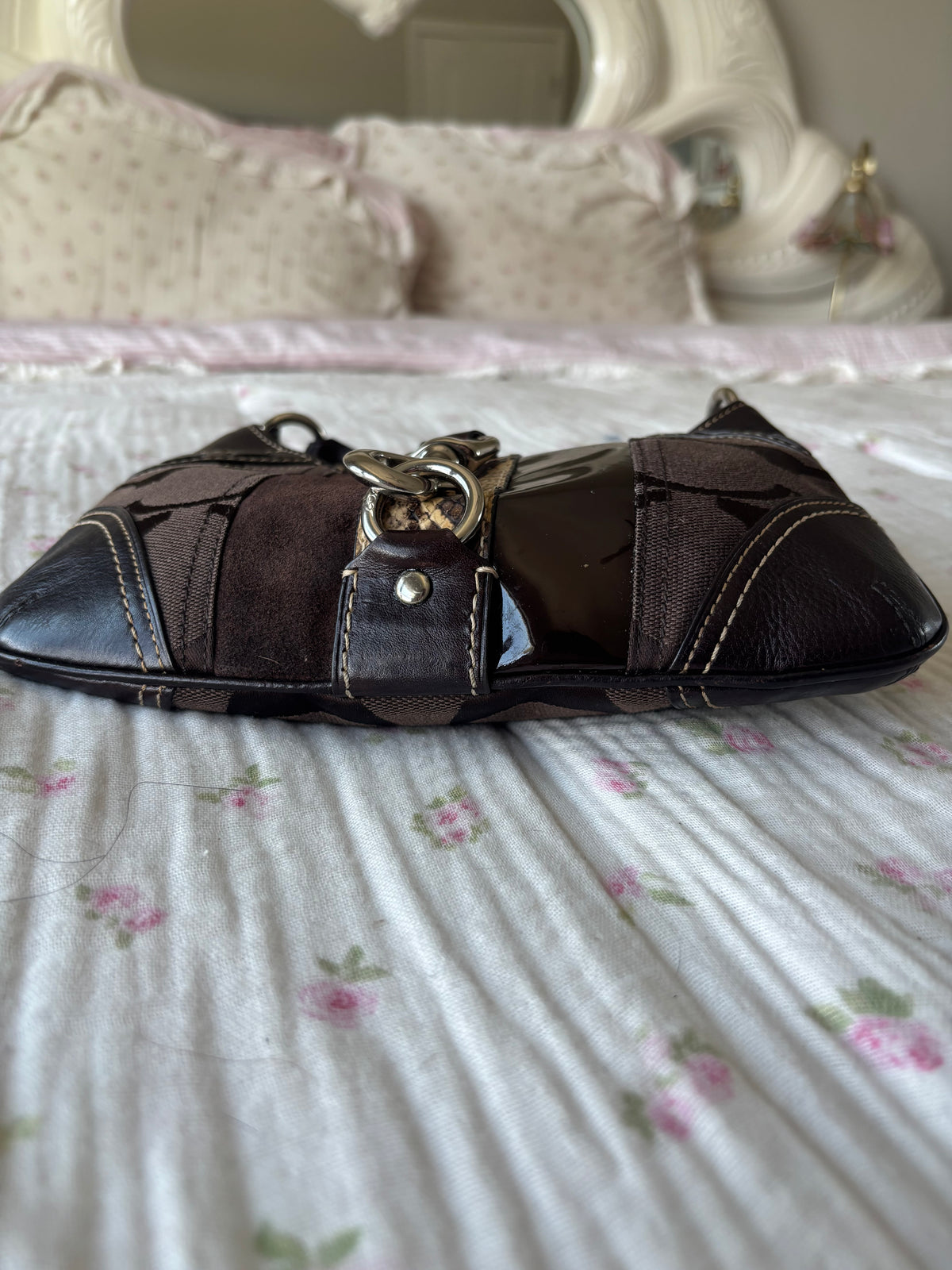 Brown mongram coach mini bag