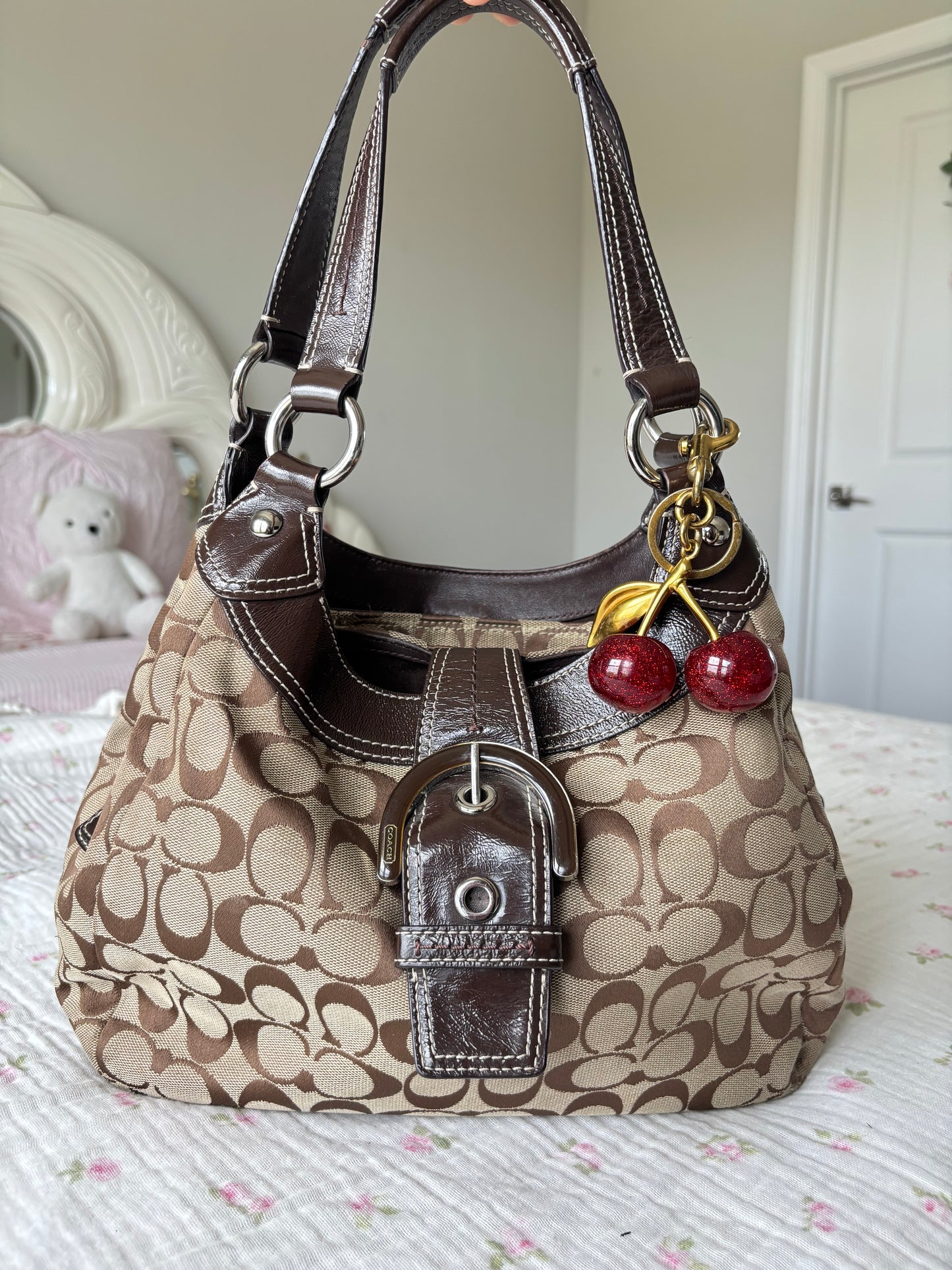 Rare brown mongram coach soho Lyn