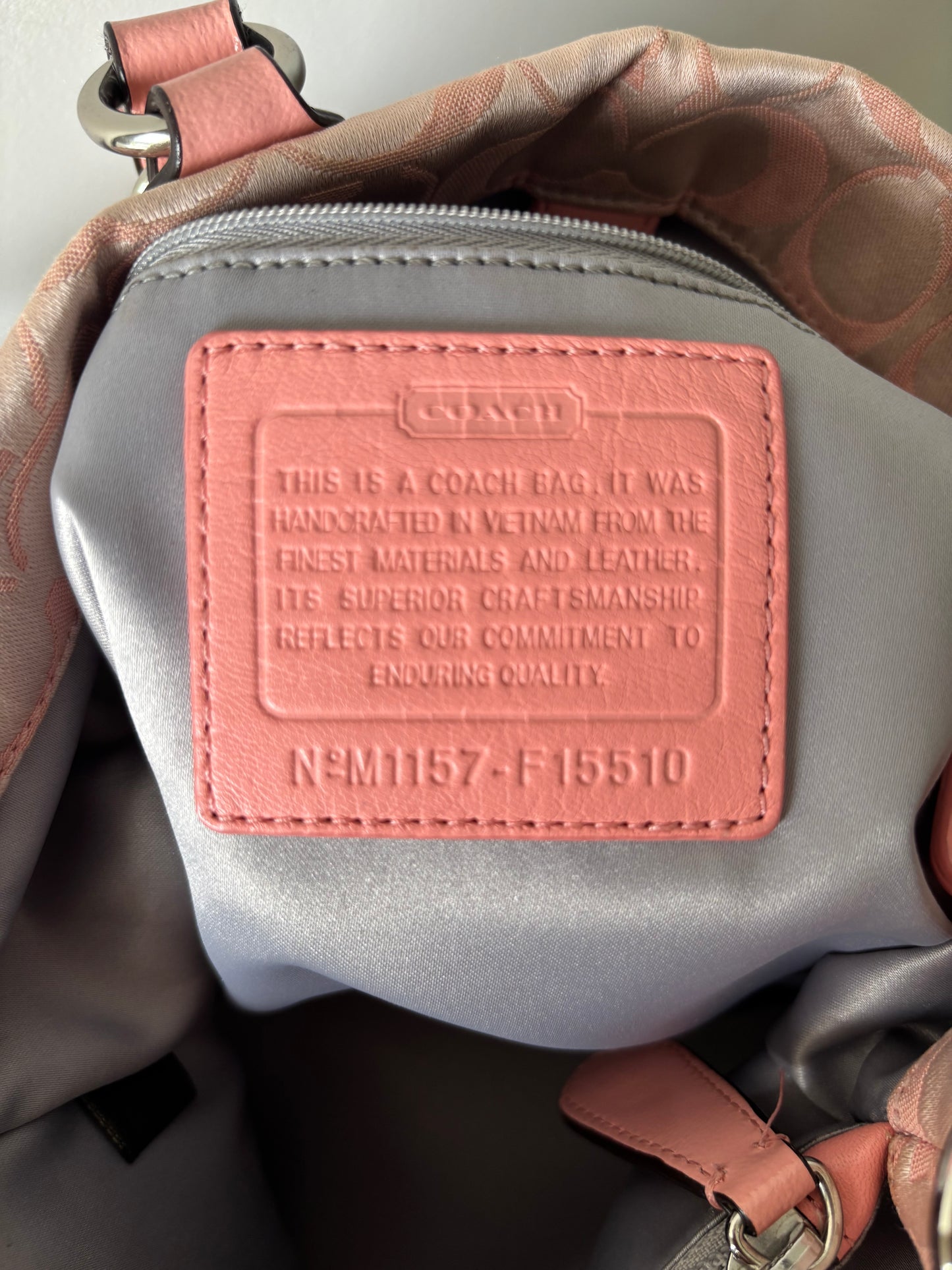 Pink mongram coach tote bag