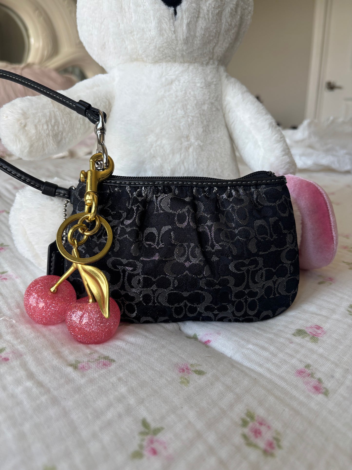 Black optic coach mini wallet