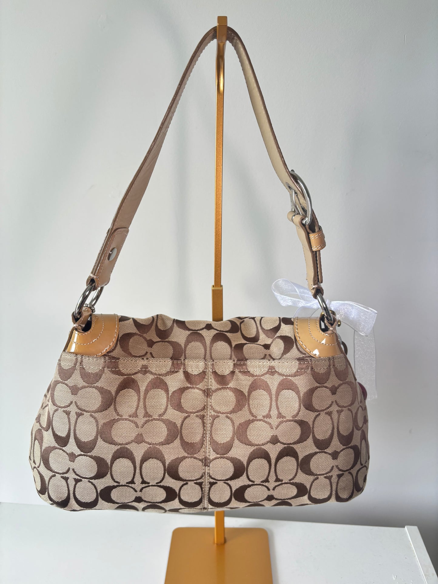 Brown mongram coach flap shoulder bag