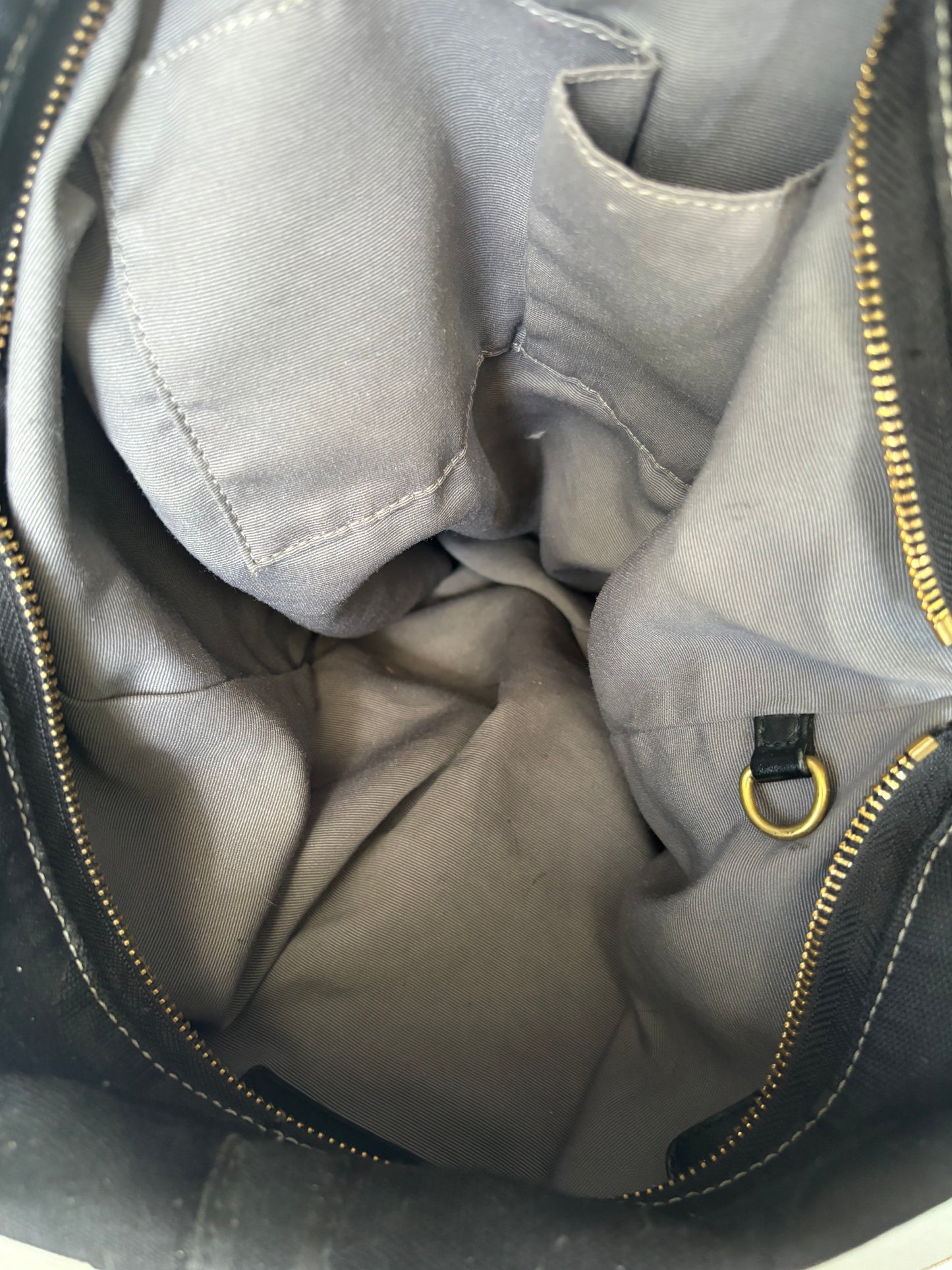 Black large coach Carly