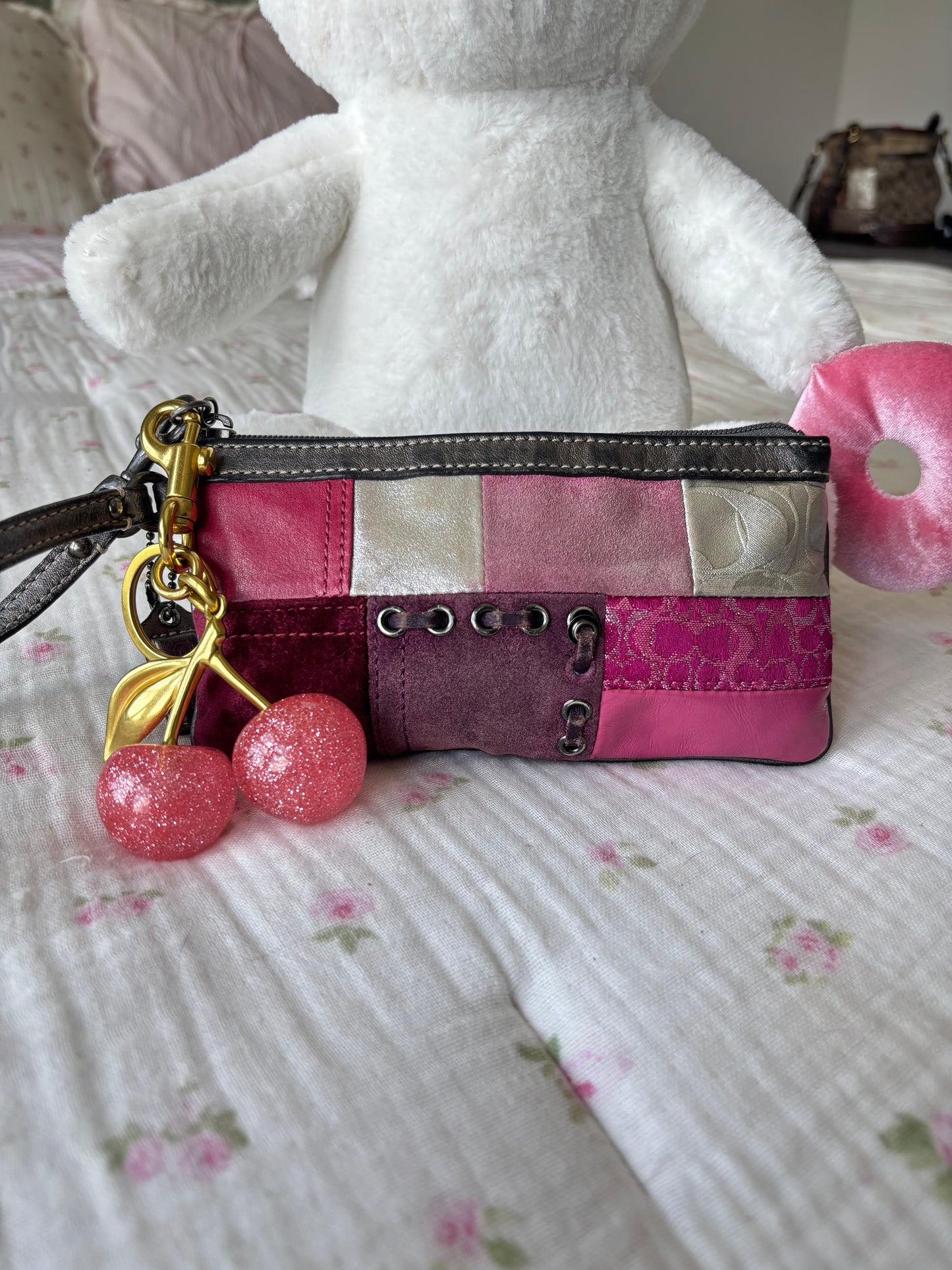 Pink patchwork coach wristlet wallet