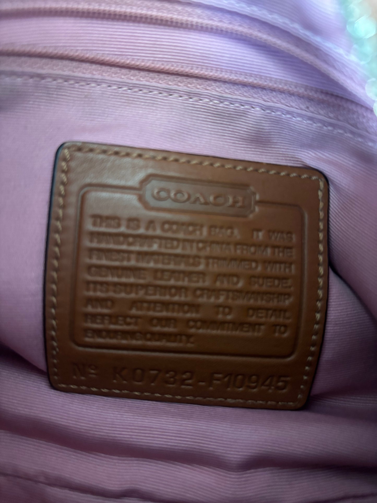 Pink mongram coach shoulder bag