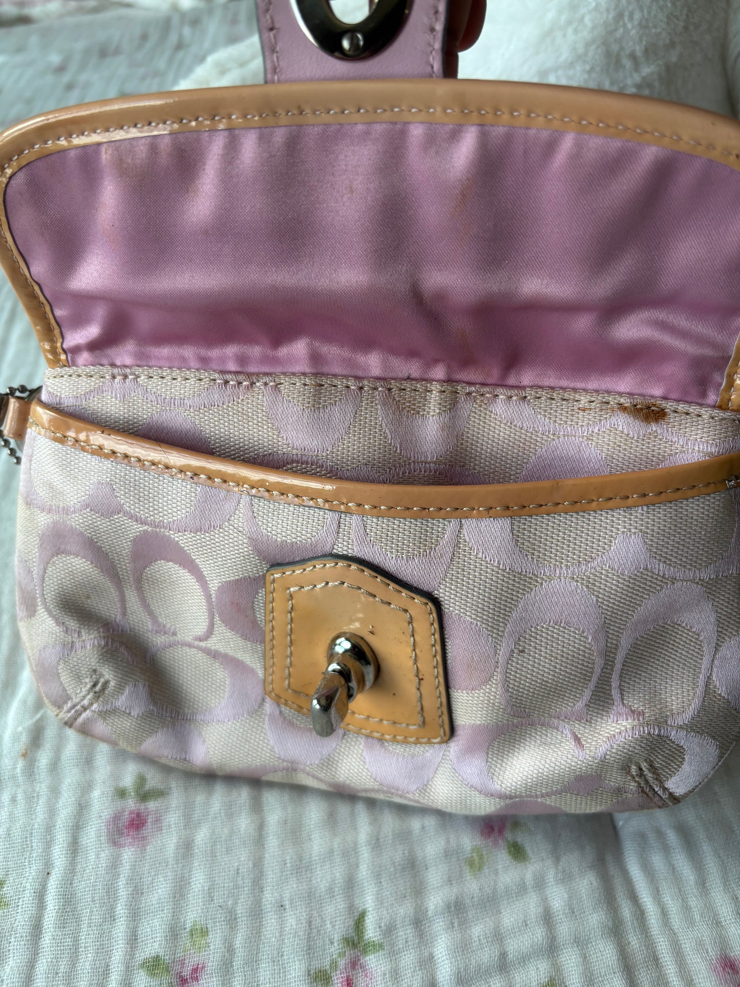 Pink mongram coach wristlet