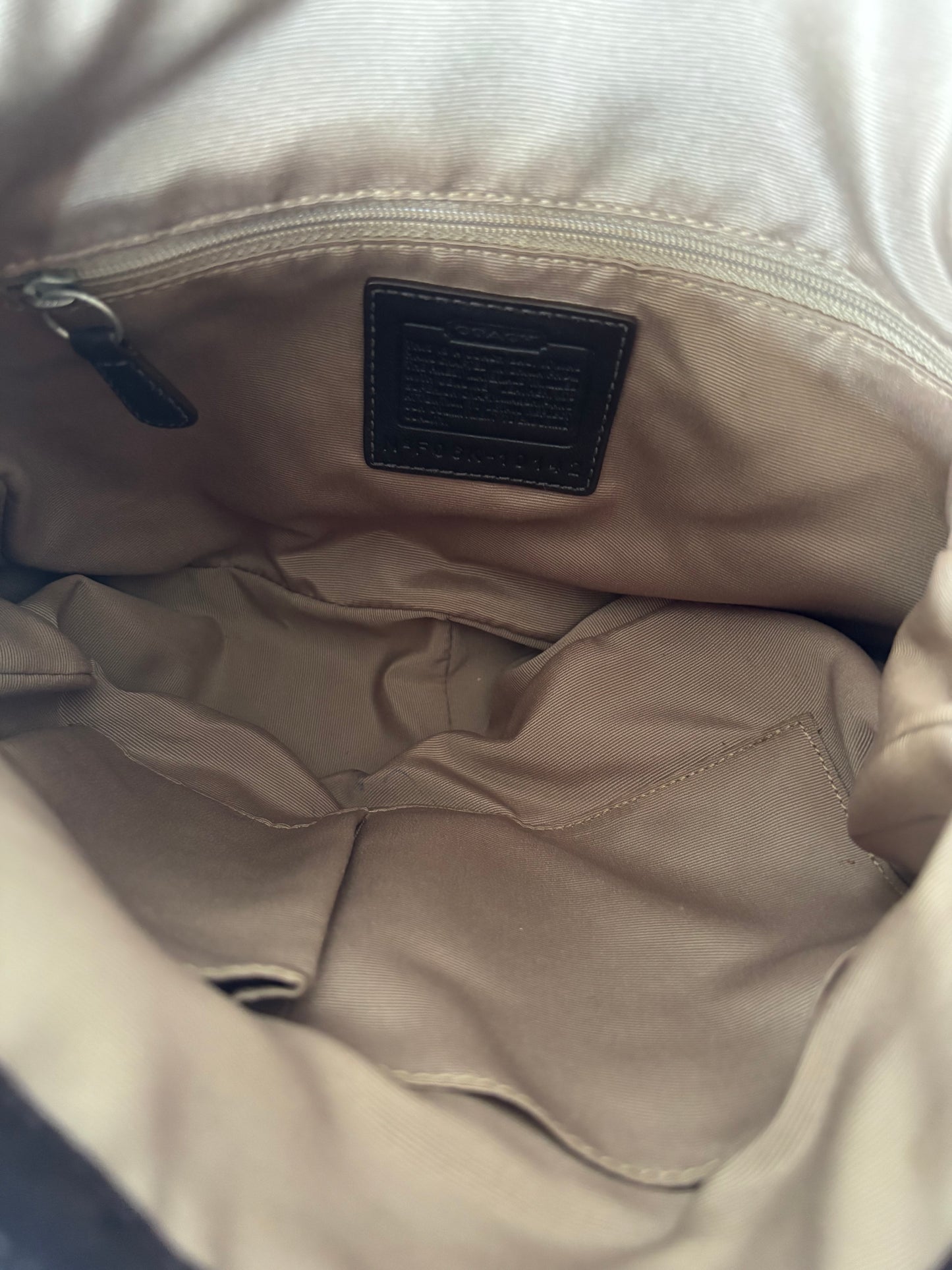 Brown optic coach shoulder bag