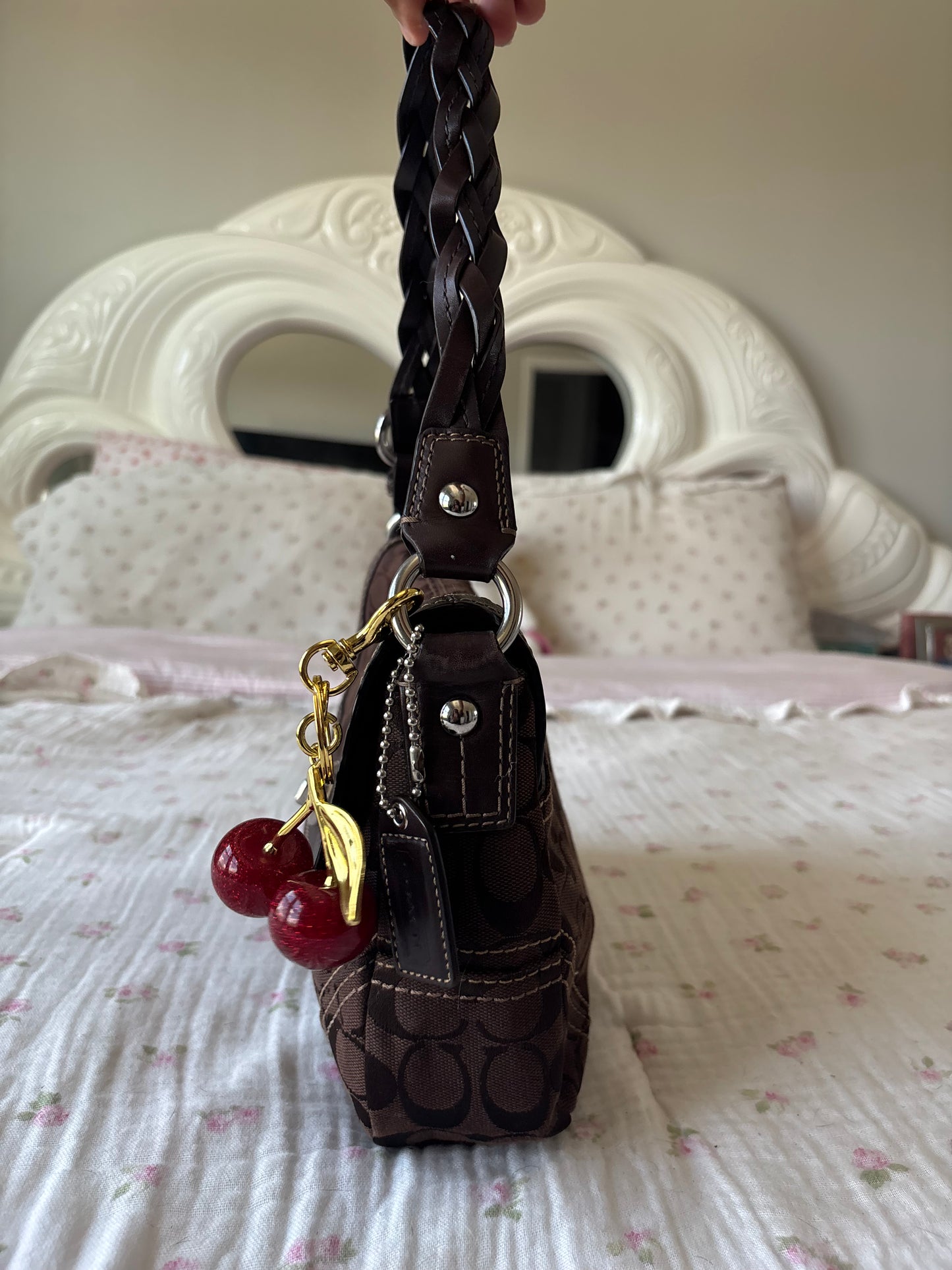 Brown mongram coach flap bag