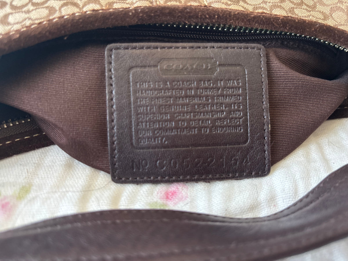 Brown mongram coach hobo bag