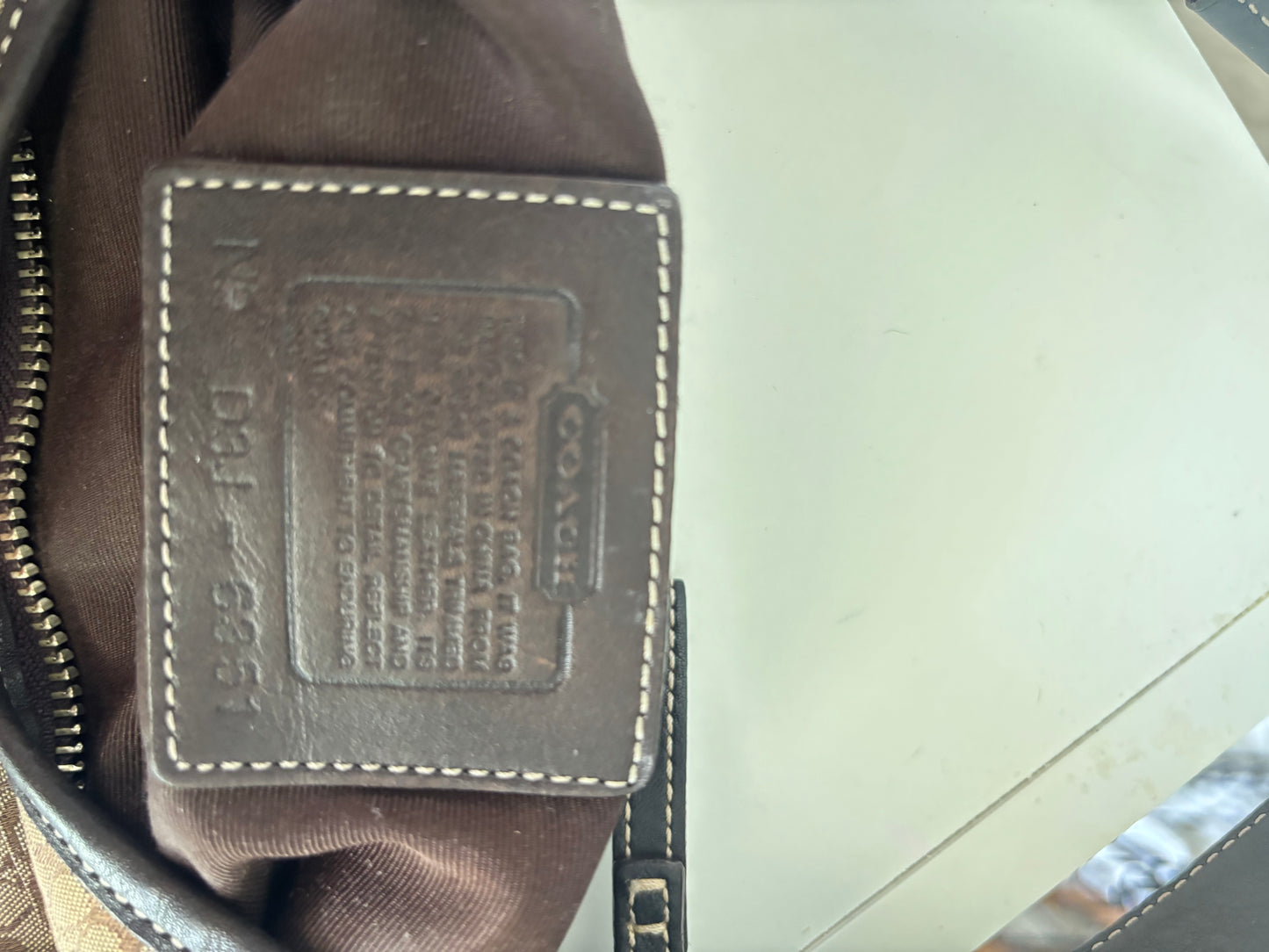 Small brown coach mini hobo