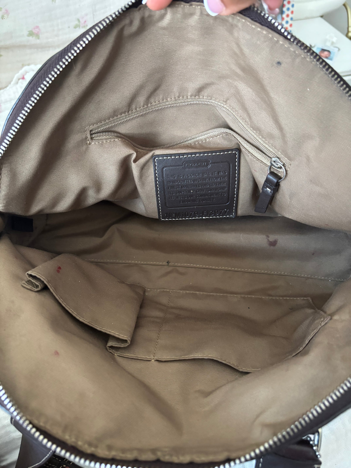 Brown mongram coach Hampton bag