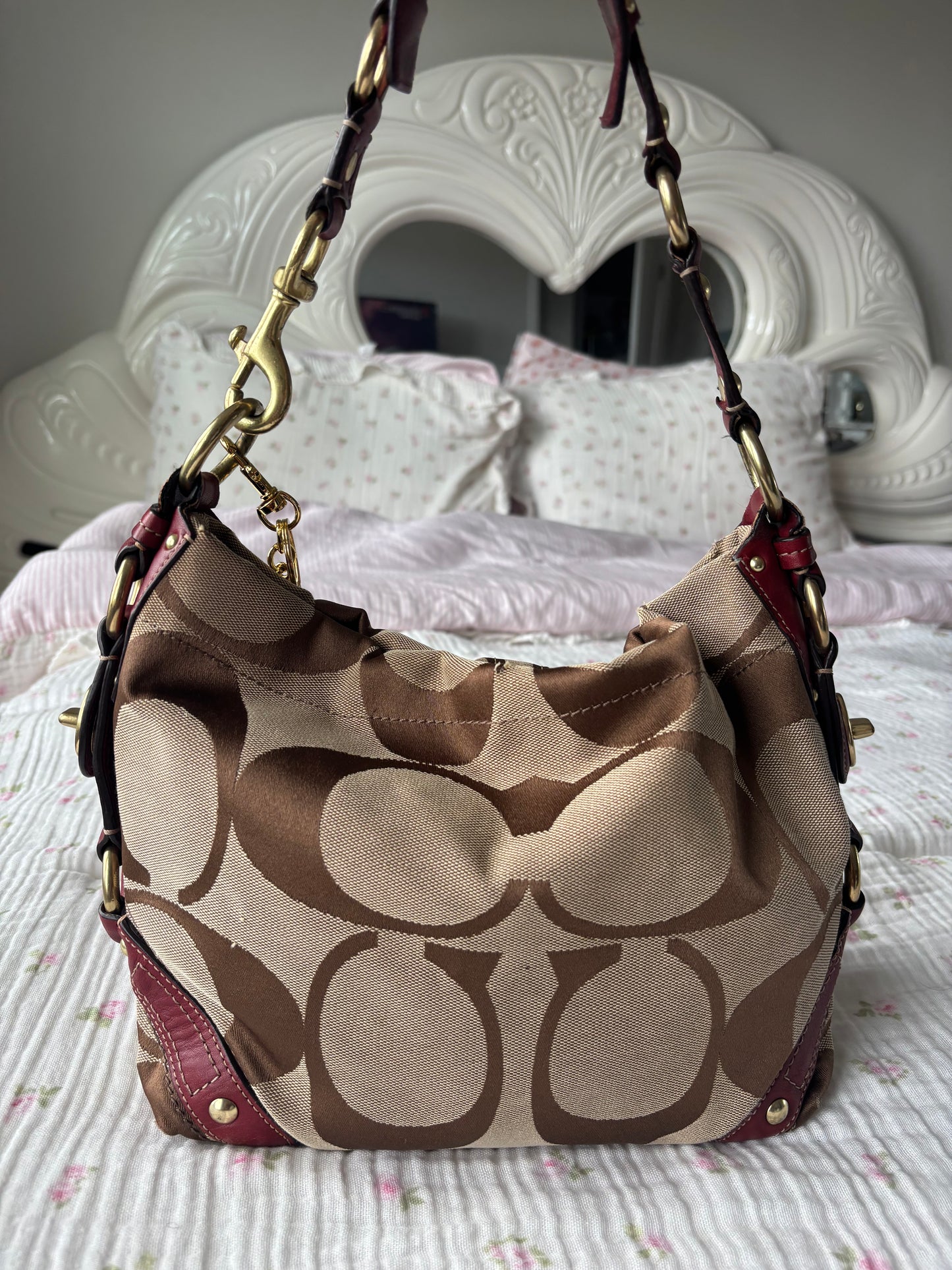 Brown mongram coach Carly