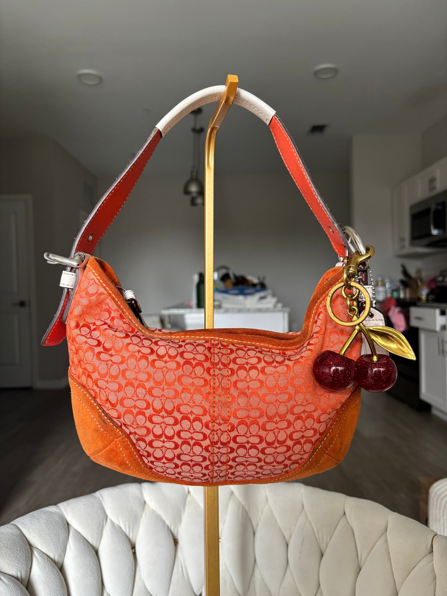 Orange coach mini hobo bag
