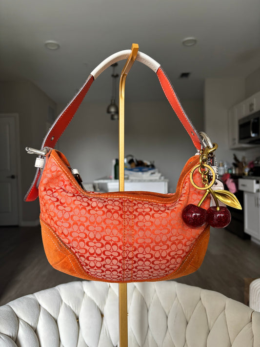 Orange coach mini hobo bag