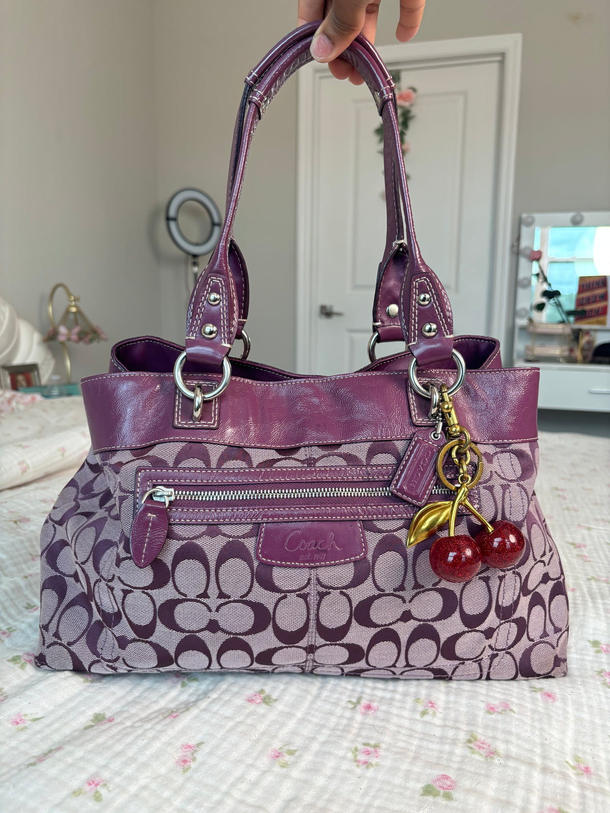 Purple mongram coach tote bag