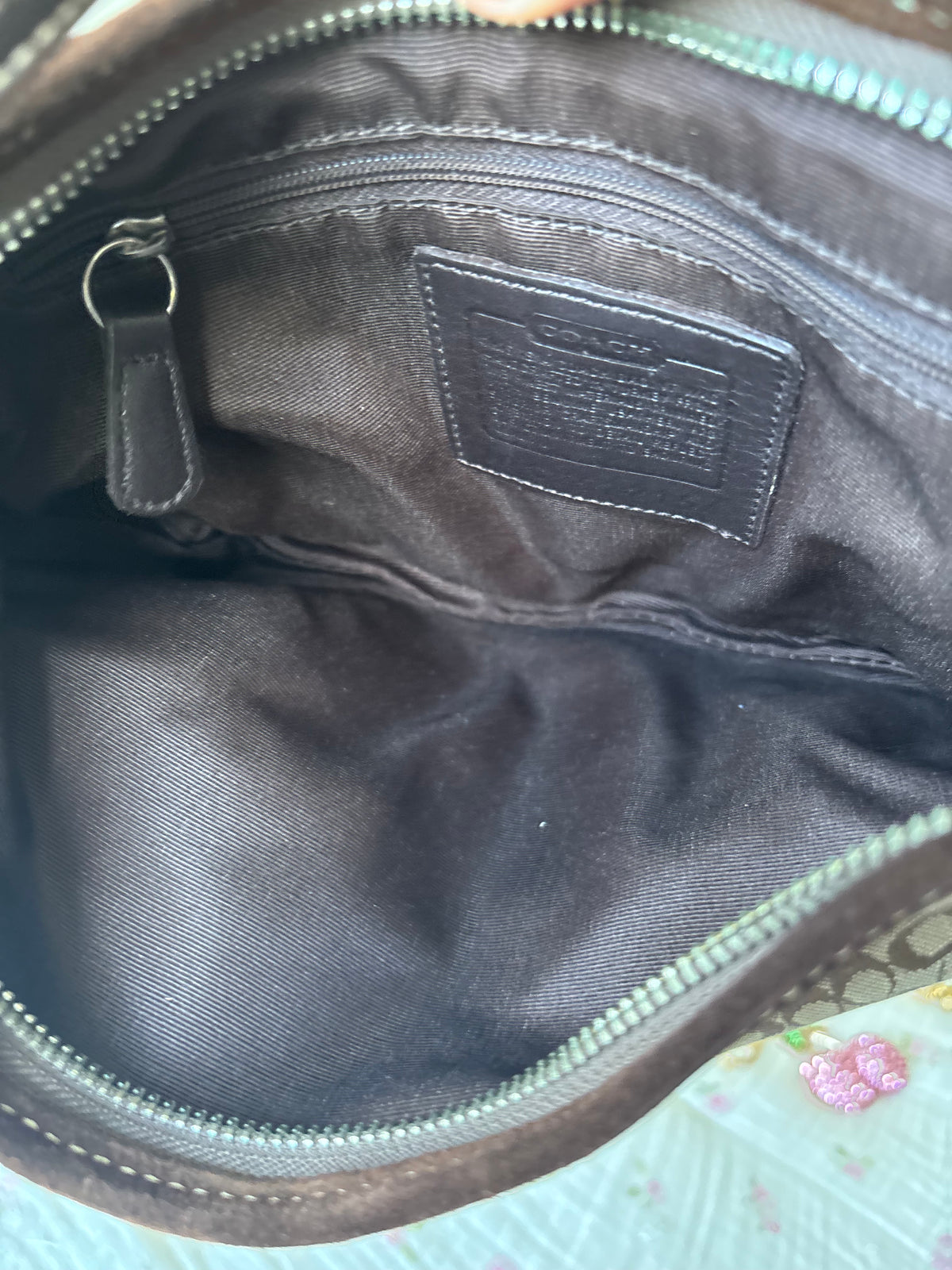 Brown mongram coach hobo bag