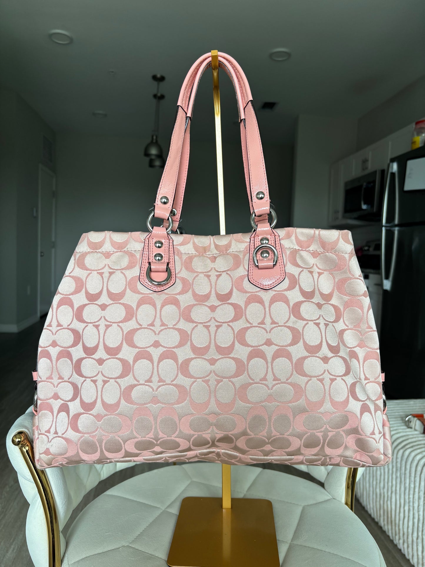 Pink mongram coach tote bag