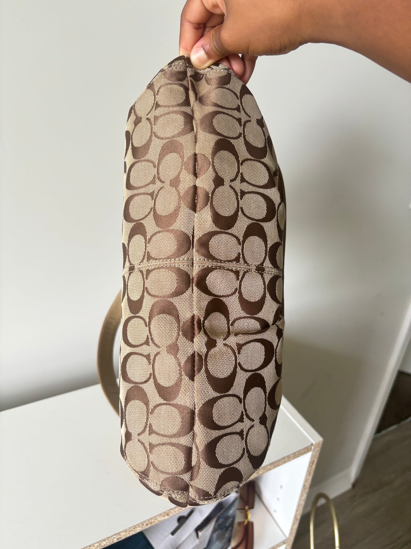 Brown mongram coach flap shoulder bag