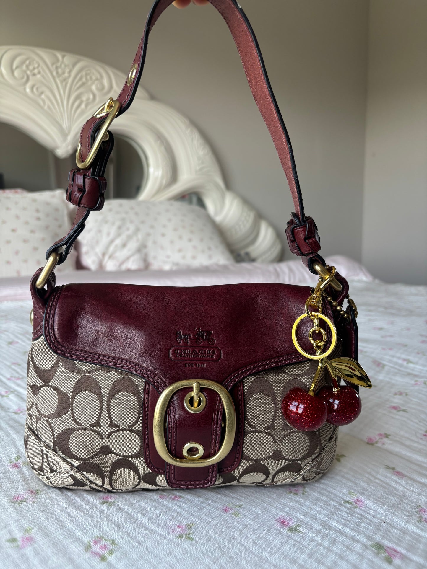 Burgandy peakook coach soho shoulder bag